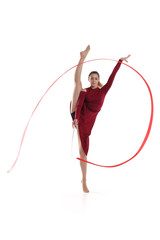 Sport gymnastic girl with a ribbon