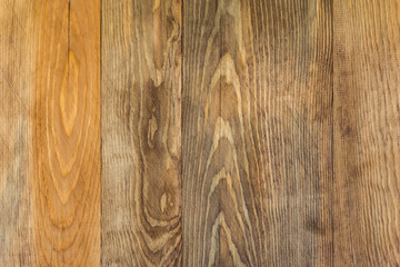 Brown wooden board with a pattern background texture, a wooden floor, a fence of natural wood, a surface of a teak wood background for design and decoration