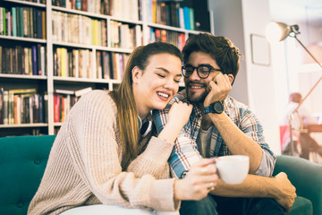 Two people in cafe enjoying the time spending with each other