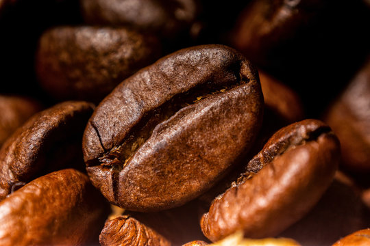 Roasted coffee beans close-up macro photo