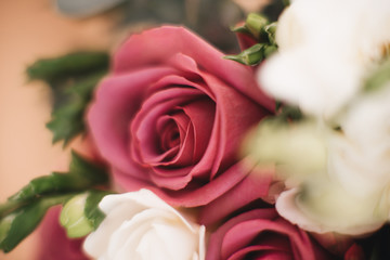 Bridal morning details. Wedding bouquet in the hands of the bride, selectoin focus