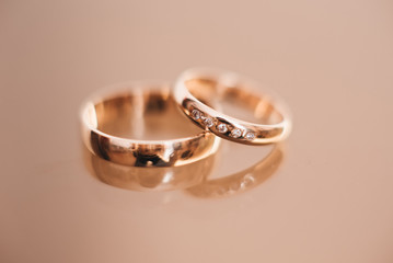 Wedding wedding rings on a light background, selective focus, macro