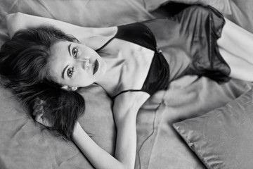 Young woman in the bedroom.