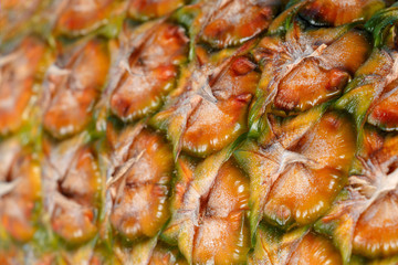 The texture of the pineapple close up, copy space