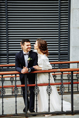 Sensual wedding Couple, groom and bride, holds each other and laughing