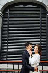 Sensual wedding Couple, groom and bride, holds each other and laughing