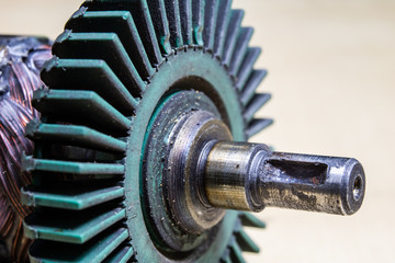 Old worn out gears in an angular gear. Mechanical accessories designed for regeneration in a repair...