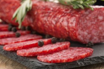 Sausage with salami with rosemary. Macro