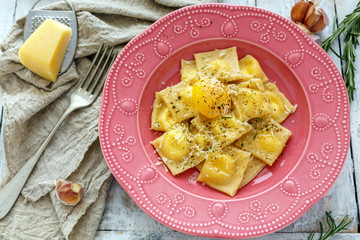 Ravioli with egg yolk, black pepper and parmesan.
