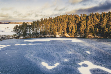 Obraz premium Aerial Photography of a Forest in Winter - vintage look edit