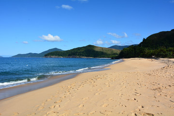 Fototapeta na wymiar beach and footprints. ocean, sand and tracks.