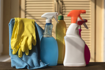 Cleaning products with rags and rubber gloves for cleaning.