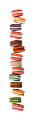 French macarons large falling arrangement vertical stacked up on white background in studio
