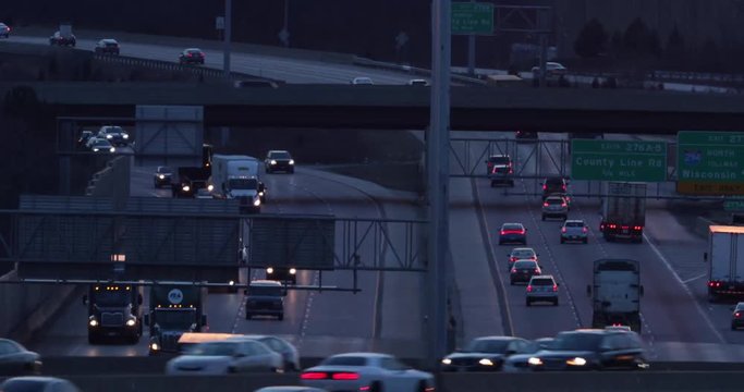 Stacked highway traffic just after sunset
