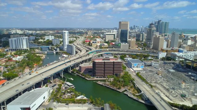 Aerial drone footage Downtown Miami Florida highways river scenic