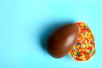 Chocolate egg with a Easter powder