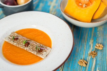 Pumpkin soup with breadstick
