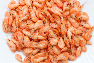 Shrimp. Shrimps lie on a plate. Boiled ready-to-eat shrimp. A large dish of small shrimps.