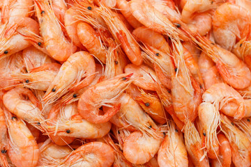 Shrimp. Shrimps lie on a plate. Boiled ready-to-eat shrimp. A large dish of small shrimps.
