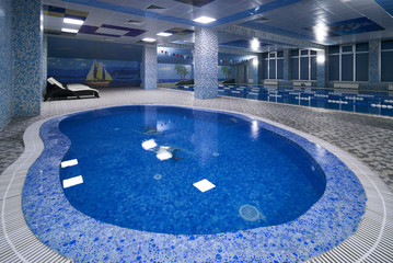 Empty indoors Children's swimming pool and big public swimming pool in fitess club