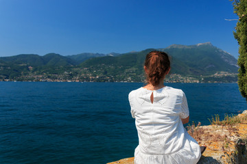 Woman looking at Lake Garda, Italy