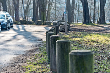 Old wood pillars on the roadside