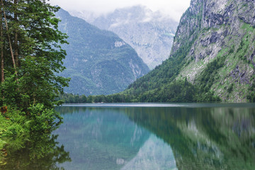Naklejka na ściany i meble Great summer panorama of the Obersee lake. Green morning scene of Swiss Alps, Nafels village location, Switzerland, Europe. Beauty of nature concept background.