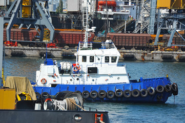 Tugboat and port cargo crane
