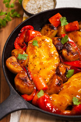 Roasted Chicken Breasts with Potatoes, Carrot and Bell Peppers. Selective focus.