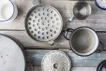 Vintage kitchen utensils on wooden background