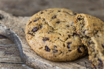 Freshly Baked Chocolate Cookies on a Cutting Board. Sweet Biscuits. Homemade pastry.