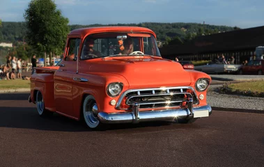 Foto op Canvas Old american chevrolet pickup truck on the road. Vintage car orange truck  - retro style.  © MAXSHOT_PL