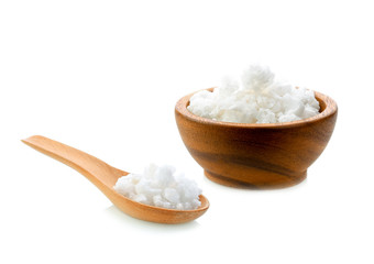 Fototapeta na wymiar salt in wood bowl , wood spoon on white background