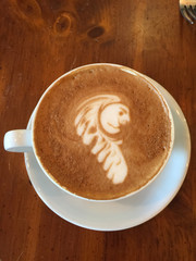 face in latte