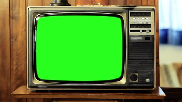 Old 80s Television Green Screen. Zoom Out. Fast.  You can replace green screen with the footage or picture you want with “Keying” effect in After Effects  (check out tutorials on YouTube). 