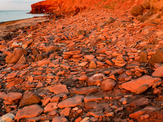 Erosion of the cliffs along the red cliffs of North Rustico and Green Gables on the Gulf of St...