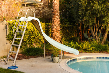 slide and pool backyard 
