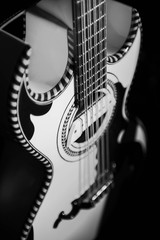 black and white photo of guitar 