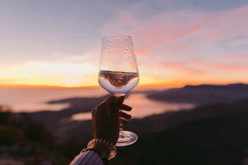 champagne glass at sunset