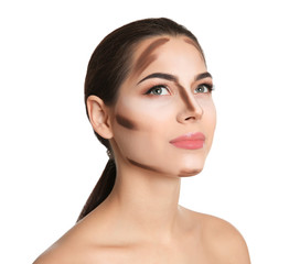 Fototapeta premium Young woman with contouring lines on her face against white background. Professional makeup products