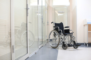 Empty modern wheelchair in hospital
