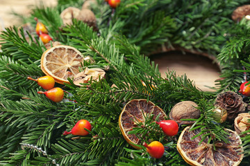 Beautiful Christmas wreath made by professional florist, closeup