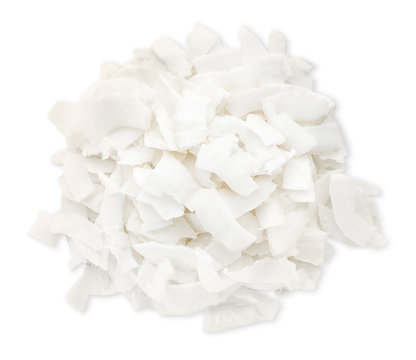 Fresh coconut flakes on white background
