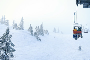 Ski lift at mountain resort. Winter vacation