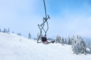 Ski lift at mountain resort. Winter vacation