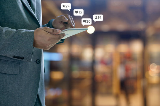 sms media man use  smart phone social media network pop notification icons