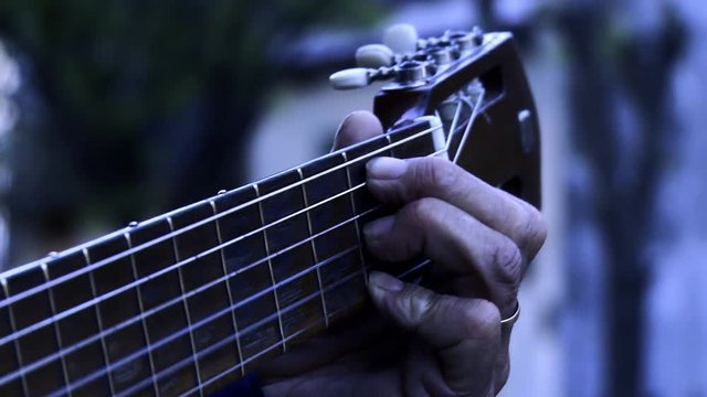 Man Playing Guitar Notes. Moonlight Tone.