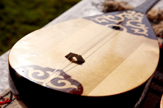 A stringed musical instrument, the national musical instrument of the Uzbekistan