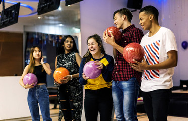 Friends bowling together after school