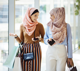 Islamic women friends shopping together on the weekend